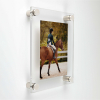 (1) 23-3/4'' x 29-3/4'' Clear Acrylic Wall Frame with (4) 3/4'' x 1'' Polished Stainless Steel Standoffs includes Screws and Anchors